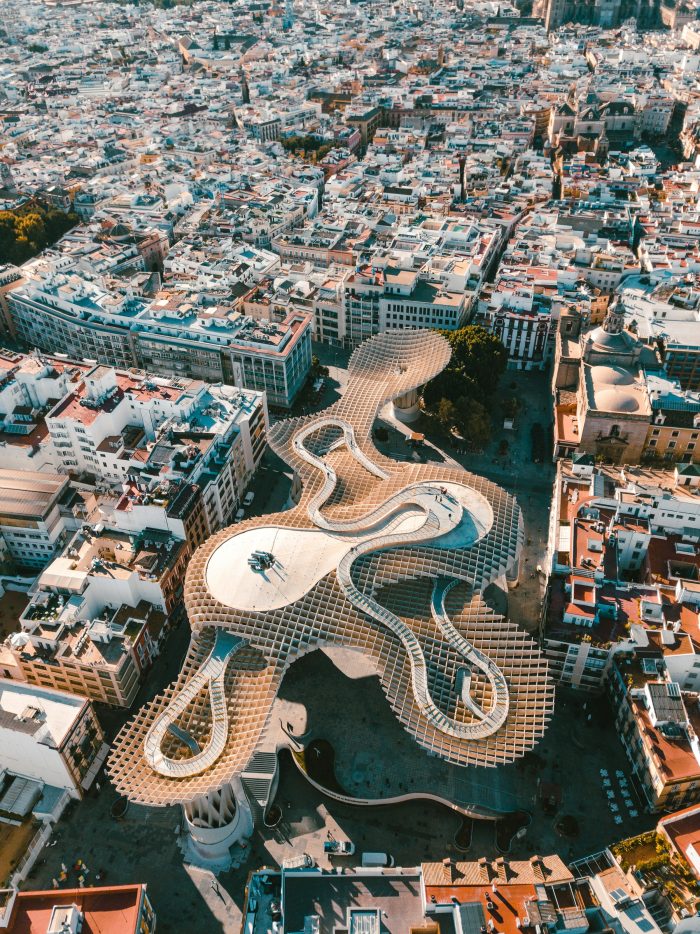 Aerial view of Sevilla, Spain – stunning cityscape with historic landmarks like Plaza de España, the Alcázar, and the Guadalquivir River
