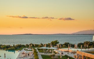 Panoramic view of Zadar, Croatia with red-roofed houses and the Adriatic Sea in the background