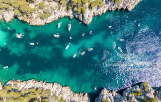 Scenic view of Marseille beach with clear blue water and sunny skies