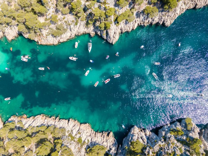 Scenic view of Marseille beach with clear blue water and sunny skies
