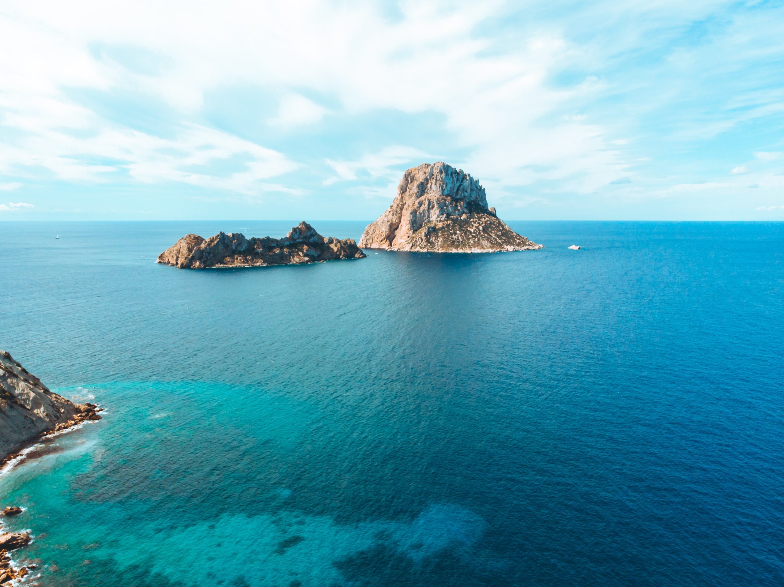 Clear blue waters and beautiful coastline of Ibiza – Avenue Travel